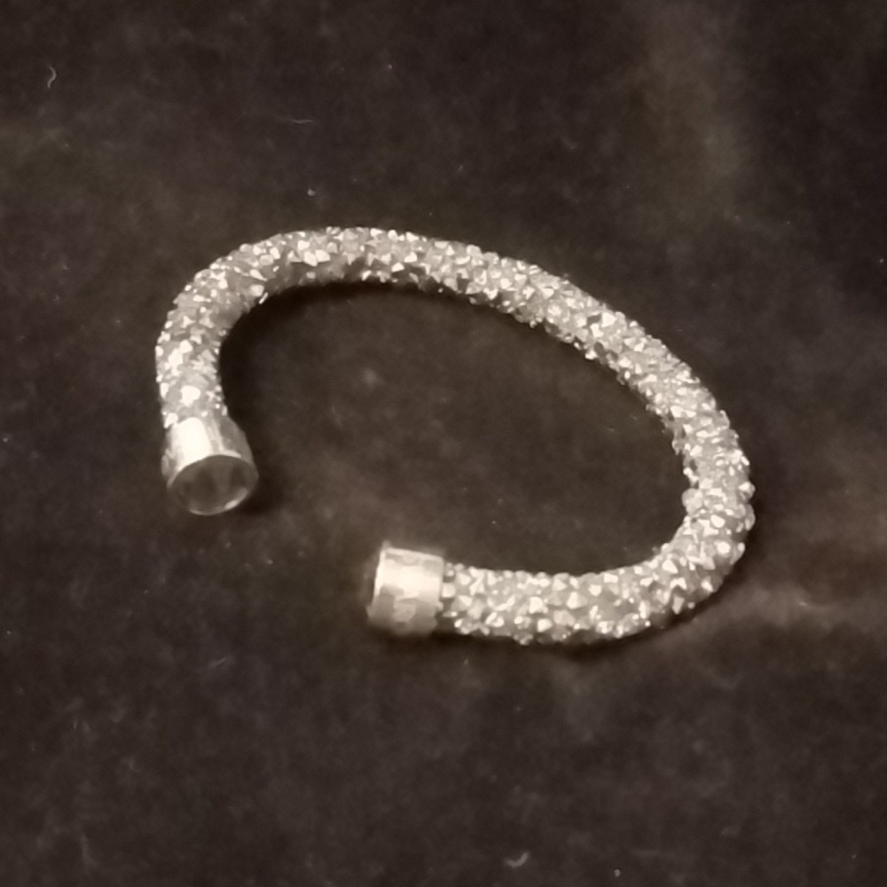 Swarovski "Crystaldust" cuff bracelet in black, measures - 6" (small)